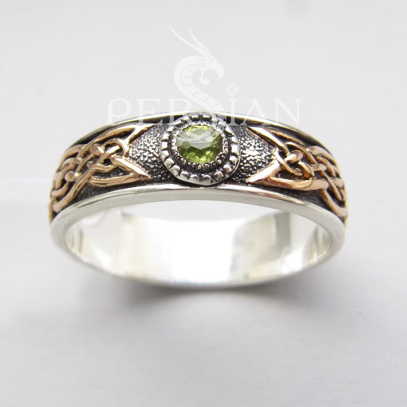 Серебряное кольцо «Кельтское Солнце» с хризолитом
